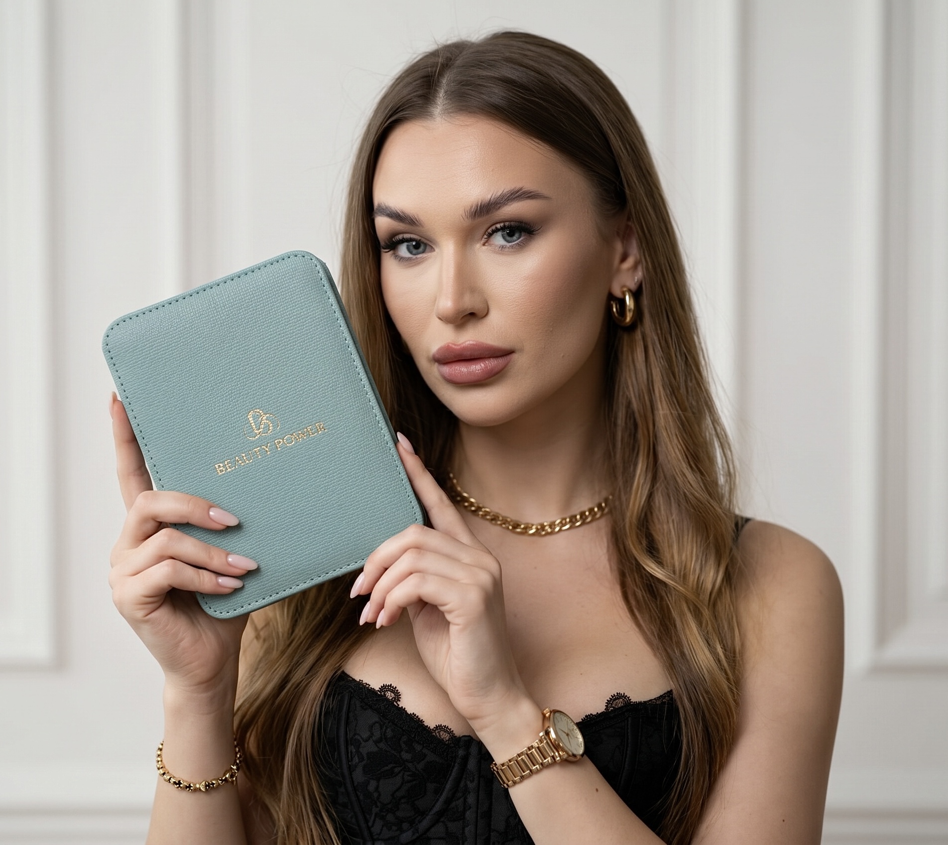 Viktoryia holding a Beauty Power branded case